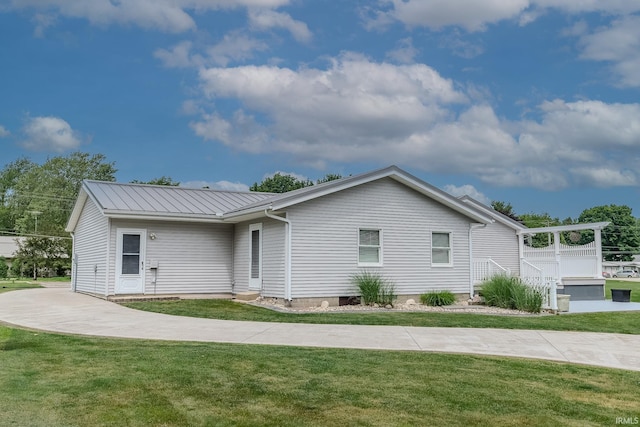 906 N Townline Rd, Lagrange, IN 46761 - single story home with a front lawn and a metal roof