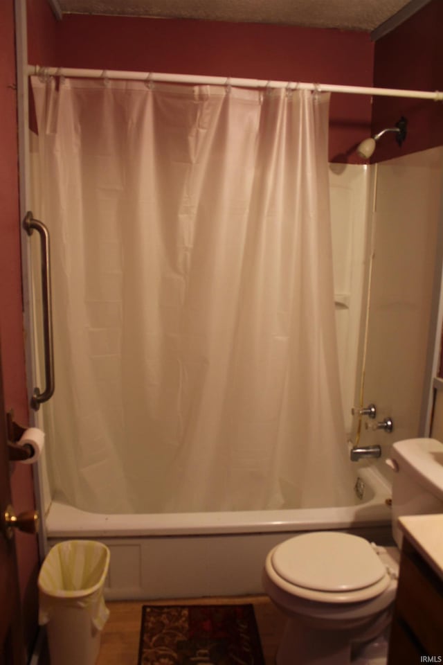 2012 S Vine St, Muncie, IN 47302 - bathroom with shower / bath combination with curtain, vanity, and wood finished floors