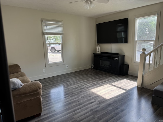 562 Railroad St, Wabash, IN 46992 - living room with a ceiling fan, dark wood finished floors, and stairs