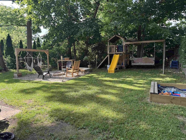 562 Railroad St, Wabash, IN 46992 - view of playground with a fire pit and a yard