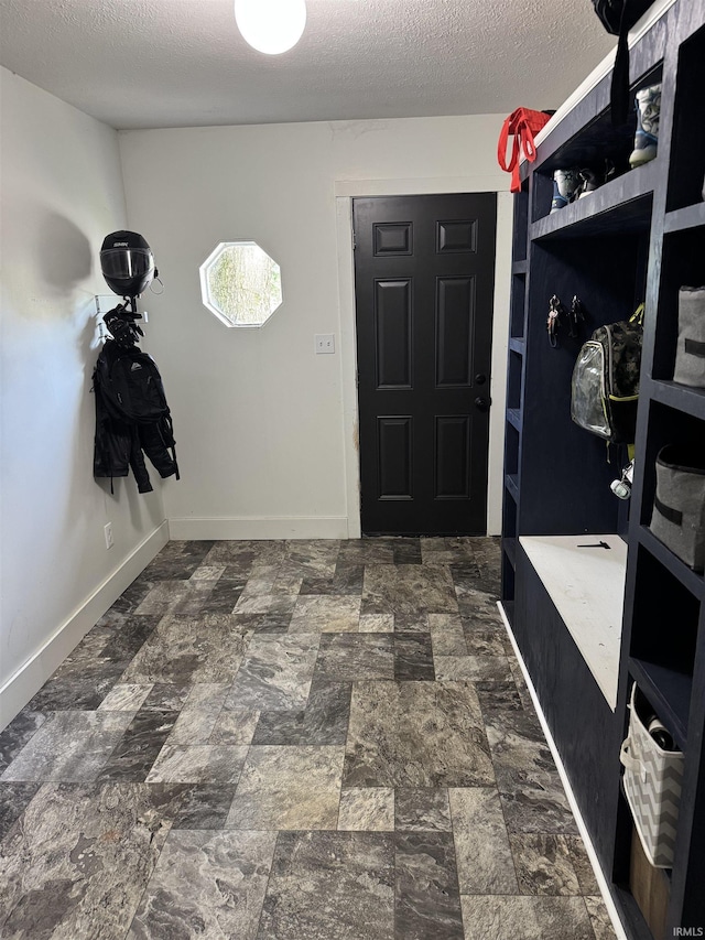 562 Railroad St, Wabash, IN 46992 - mudroom with a textured ceiling and baseboards