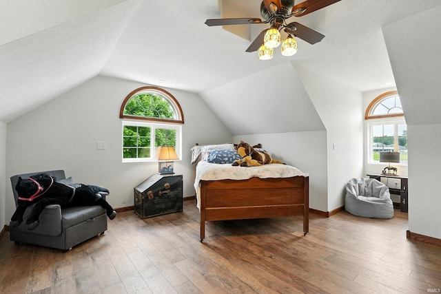 14743 Leesburg Rd, Fort Wayne, IN 46818 - bedroom featuring vaulted ceiling, wood-type flooring, and ceiling fan