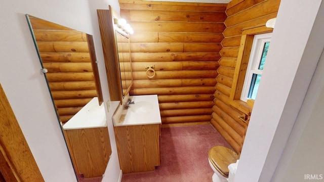 4115 N Aquarius Dr, Monticello, IN 47960 - bathroom featuring vanity and rustic walls