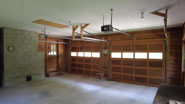 4115 N Aquarius Dr, Monticello, IN 47960 - garage featuring a garage door opener