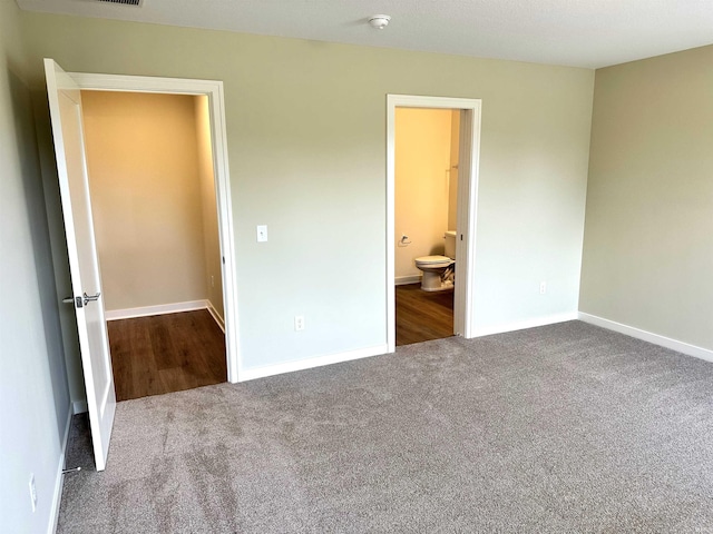 1466 Monte Carlo Dr, Huntertown, IN 46748 - unfurnished bedroom with carpet and connected bathroom