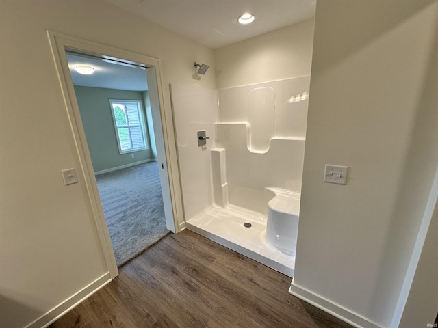 1466 Monte Carlo Dr, Huntertown, IN 46748 - bathroom featuring a shower and wood finished floors