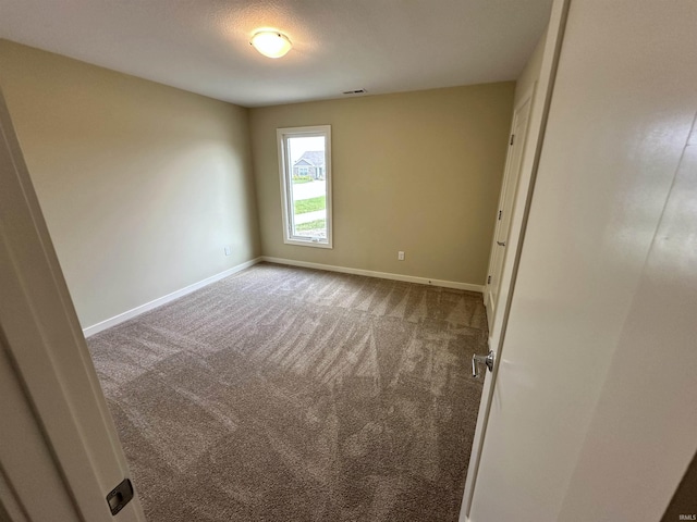 1466 Monte Carlo Dr, Huntertown, IN 46748 - unfurnished room with baseboards and carpet flooring