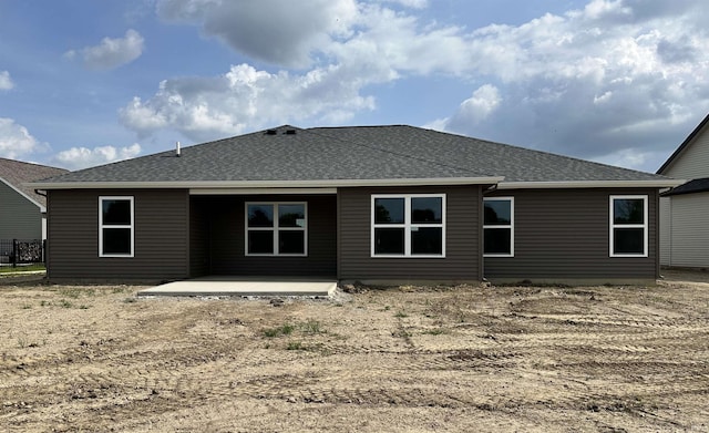 1466 Monte Carlo Dr, Huntertown, IN 46748 - rear view of house with roof with shingles and a patio area