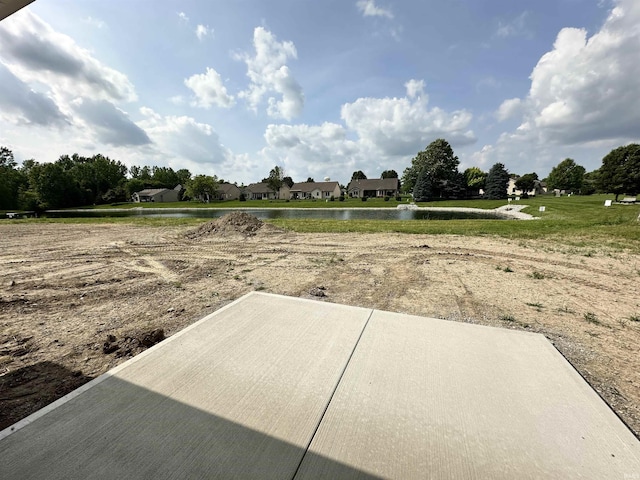 1466 Monte Carlo Dr, Huntertown, IN 46748 - view of yard with a water view and a patio