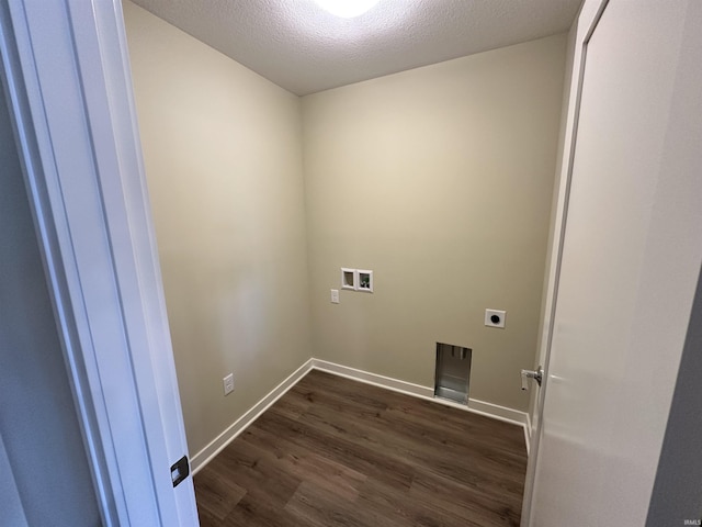 1466 Monte Carlo Dr, Huntertown, IN 46748 - laundry room with electric dryer hookup, dark wood-style flooring, hookup for a washing machine, and a textured ceiling