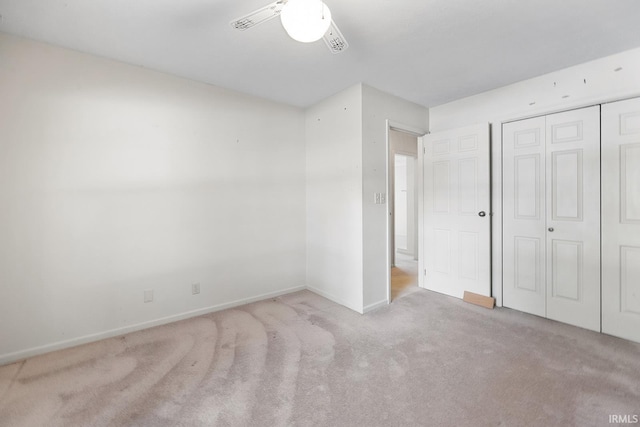 106 W Navajo St, West Lafayette, IN 47906 - unfurnished bedroom with carpet flooring, a closet, and a ceiling fan