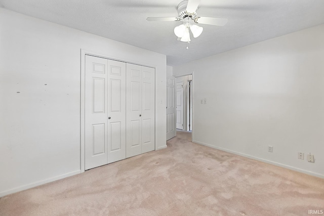 106 W Navajo St, West Lafayette, IN 47906 - unfurnished bedroom featuring carpet, a closet, and ceiling fan