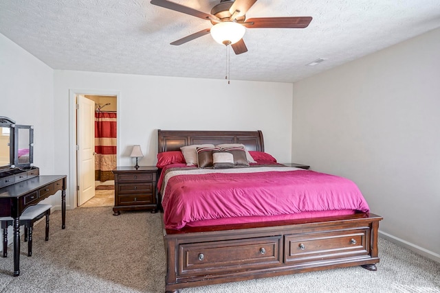 140 Wadsworth Ct, Lafayette, IN 47905 - bedroom with carpet flooring, a textured ceiling, connected bathroom, and a ceiling fan