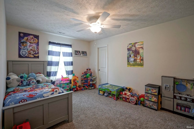 140 Wadsworth Ct, Lafayette, IN 47905 - carpeted bedroom with a textured ceiling and a ceiling fan