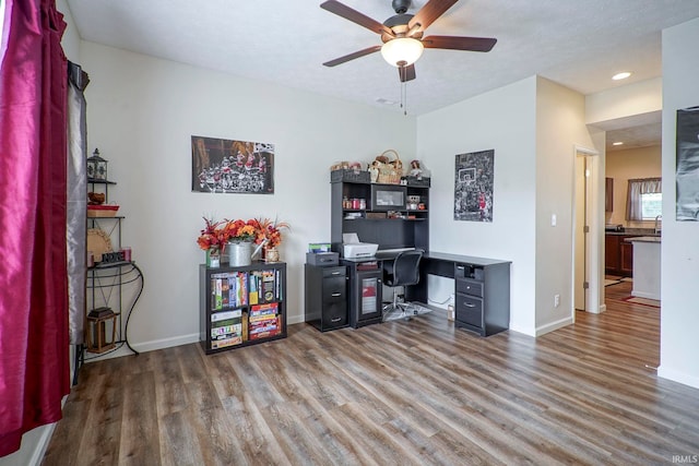 140 Wadsworth Ct, Lafayette, IN 47905 - home office with wood finished floors, a ceiling fan, and recessed lighting