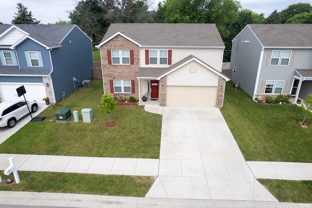 140 Wadsworth Ct, Lafayette, IN 47905 - traditional-style home with brick siding, driveway, and a front yard