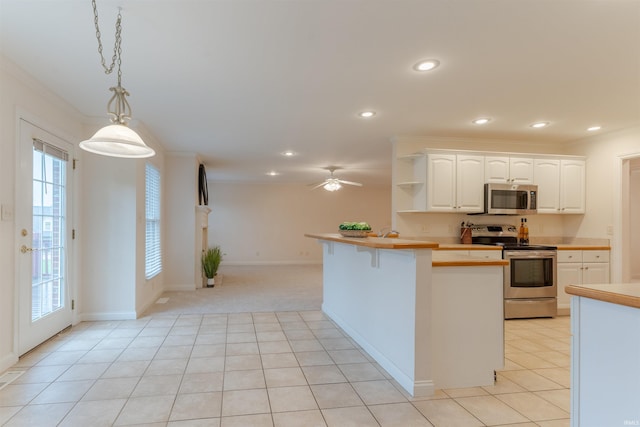 7561 Saint Jordan Cir, Newburgh, IN 47630 - kitchen featuring appliances with stainless steel finishes, open shelves, ornamental molding, white cabinets, and recessed lighting