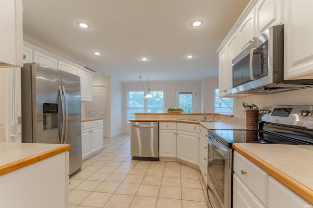 7561 Saint Jordan Cir, Newburgh, IN 47630 - kitchen featuring stainless steel appliances, white cabinets, light countertops, plenty of natural light, and recessed lighting