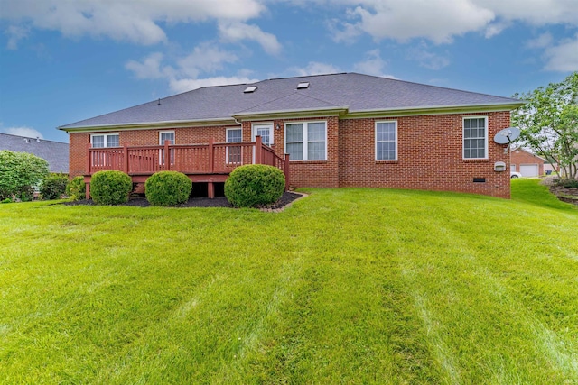 7561 Saint Jordan Cir, Newburgh, IN 47630 - back of house featuring a deck, a yard, brick siding, and roof with shingles