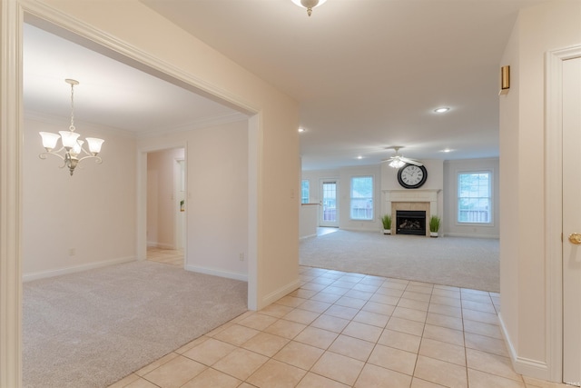 7561 Saint Jordan Cir, Newburgh, IN 47630 - interior space featuring light carpet, a chandelier, a fireplace, recessed lighting, and a ceiling fan