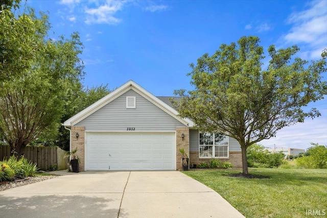 3933 Electra Ct, Lafayette, IN 47905 - view of front of house with brick siding, concrete driveway, and an attached garage