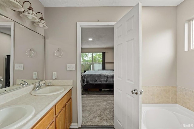 3933 Electra Ct, Lafayette, IN 47905 - ensuite bathroom featuring double vanity and a bath