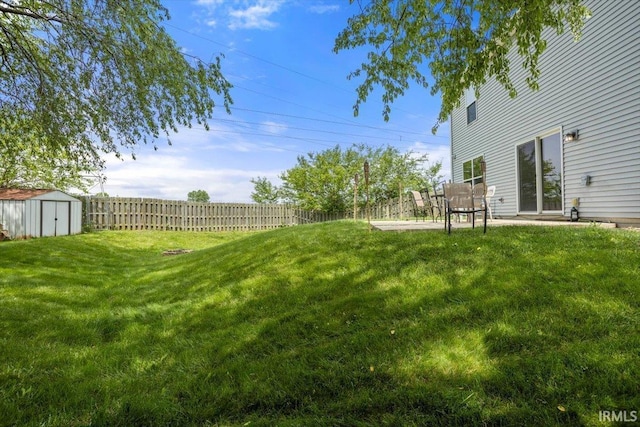 3933 Electra Ct, Lafayette, IN 47905 - fenced backyard featuring a storage unit and a patio