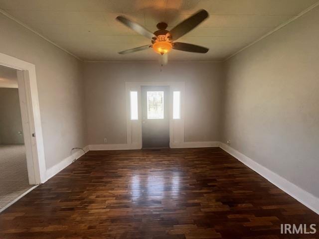 608 W Main St, Greentown, IN 46936 - unfurnished room featuring ceiling fan, wood finished floors, and ornamental molding
