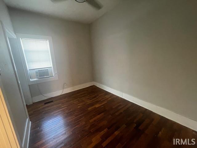 608 W Main St, Greentown, IN 46936 - spare room with wood finished floors, ceiling fan, and cooling unit