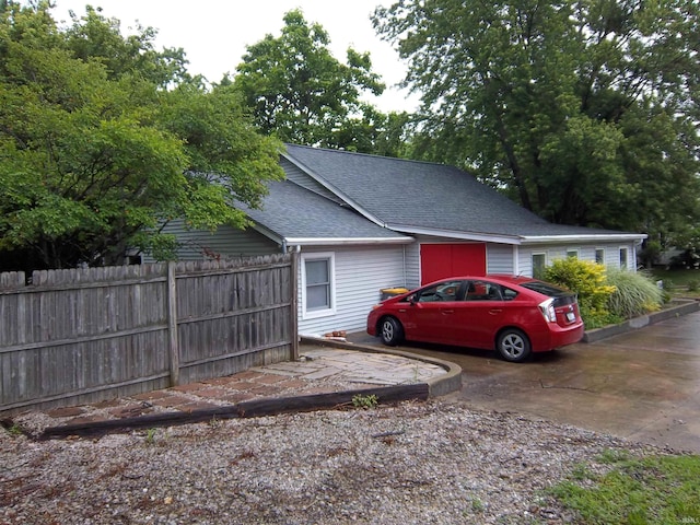 917 N Maple St, Bloomington, IN 47404 - view of property exterior featuring roof with shingles