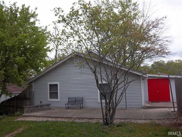 917 N Maple St, Bloomington, IN 47404 - view of home's exterior with a patio area