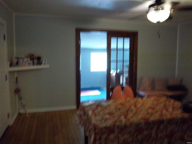 917 N Maple St, Bloomington, IN 47404 - bedroom with wood finished floors and ceiling fan