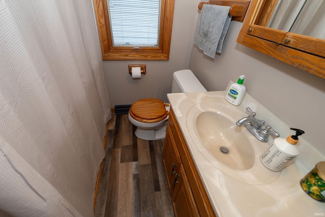 1121 S 23rd St, South Bend, IN 46615 - bathroom with vanity, wood finished floors, and curtained shower
