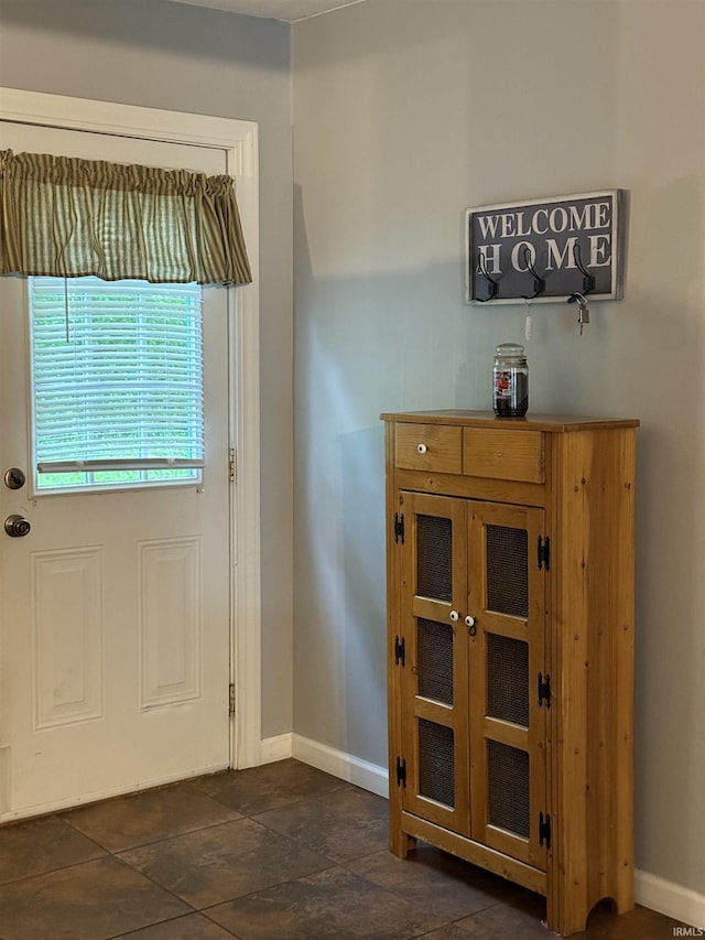 701 E Water St, Princeton, IN 47670 - doorway to outside with baseboards