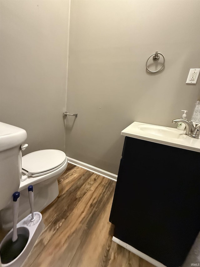 701 E Water St, Princeton, IN 47670 - bathroom featuring vanity and wood finished floors