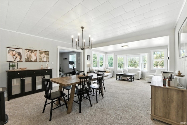 428 E Washington St, Bluffton, IN 46714 - dining space with light colored carpet and a chandelier