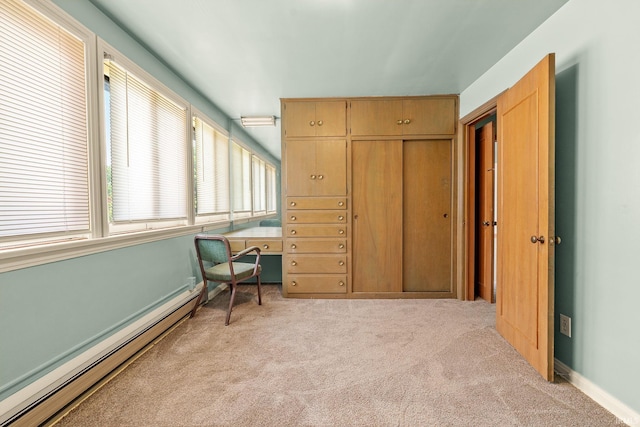 1208 Delta Blvd, Fort Wayne, IN 46805 - living area with a baseboard heating unit and light carpet