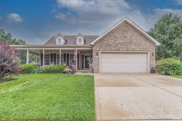 4600 N Shadow Wood Dr, Bloomington, IN 47404 - view of front of house featuring brick siding, an attached garage, a front lawn, and driveway