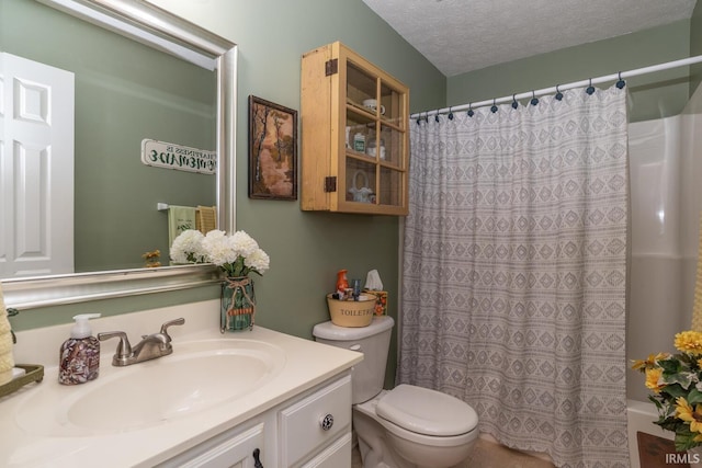 4600 N Shadow Wood Dr, Bloomington, IN 47404 - bathroom with vanity, a textured ceiling, and shower / bath combo