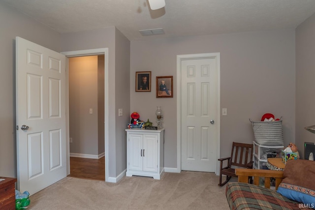 4600 N Shadow Wood Dr, Bloomington, IN 47404 - living area featuring light colored carpet and a ceiling fan
