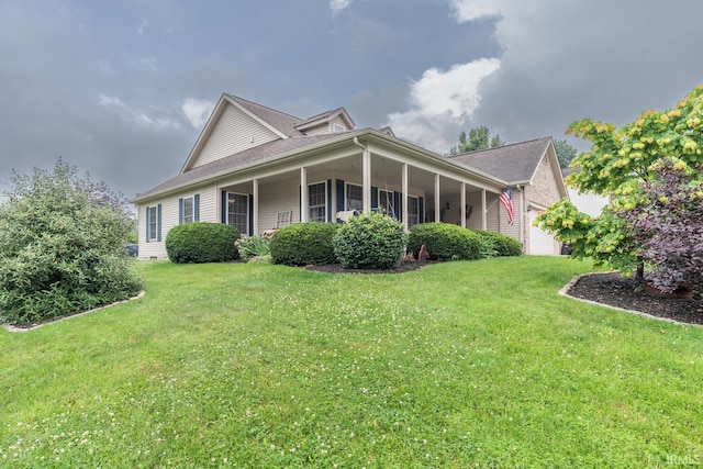 4600 N Shadow Wood Dr, Bloomington, IN 47404 - view of front of house with a garage and a front lawn