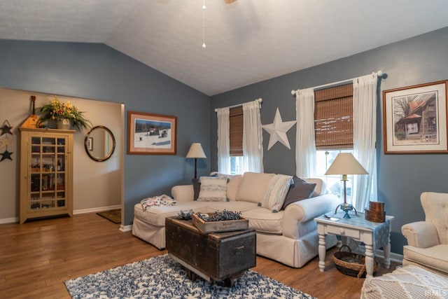 4600 N Shadow Wood Dr, Bloomington, IN 47404 - living room featuring wood finished floors and vaulted ceiling