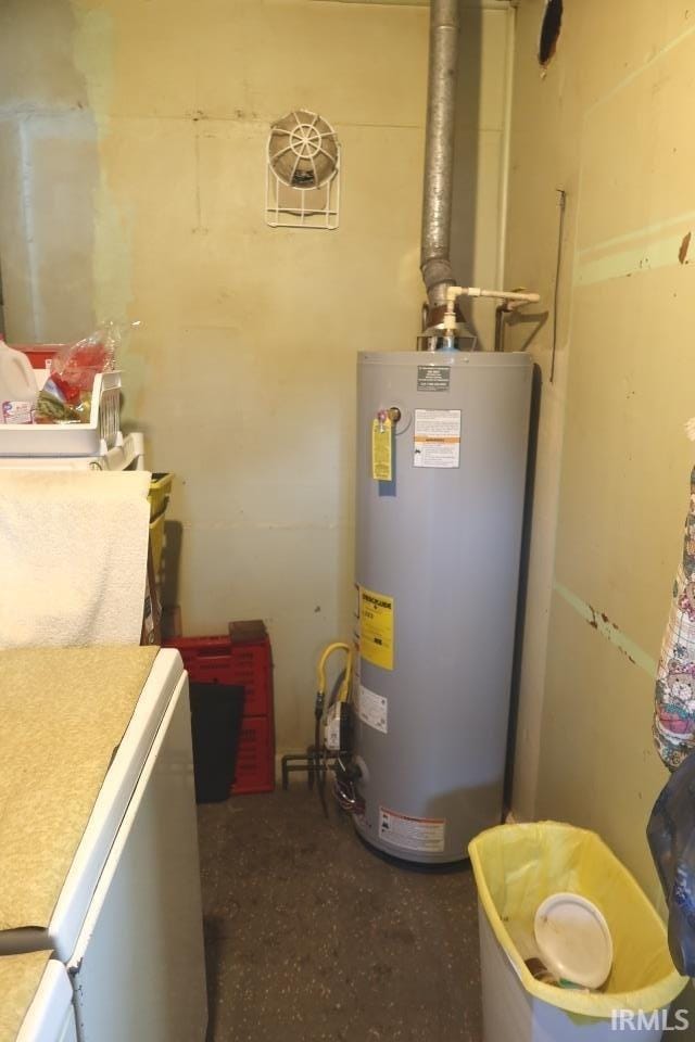 1120 E Fourth St, Mount Vernon, IN 47620 - utility room with water heater