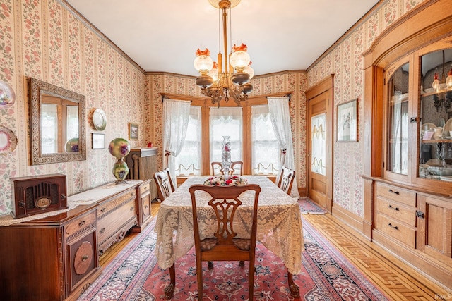 8 Hale St, Lafontaine, IN 46940 - dining room featuring wallpapered walls, a chandelier, healthy amount of natural light, light wood finished floors, and ornamental molding