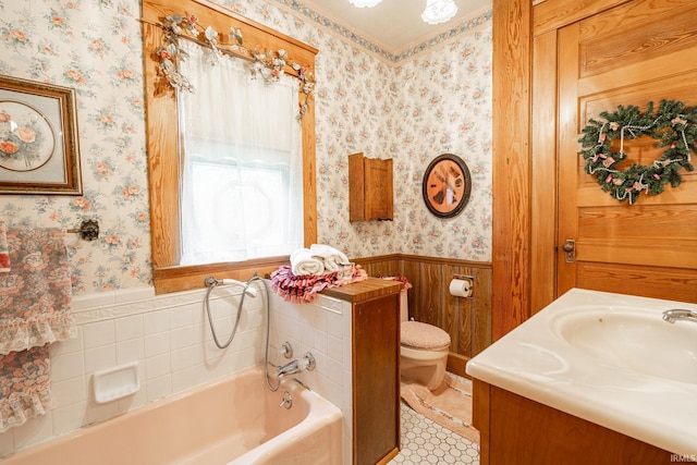 8 Hale St, Lafontaine, IN 46940 - bathroom with wainscoting, vanity, a garden tub, and wallpapered walls
