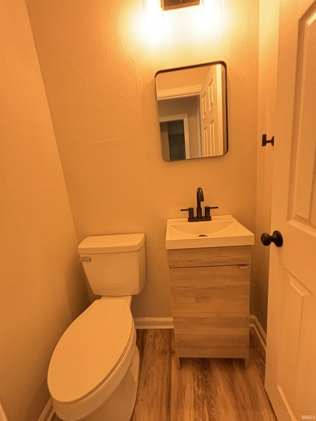 205 Corwin Ln, Fort Wayne, IN 46816 - half bathroom with vanity and wood finished floors