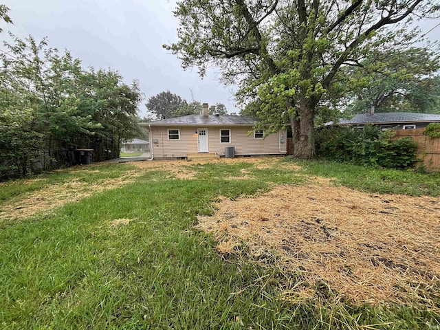 205 Corwin Ln, Fort Wayne, IN 46816 - rear view of house with crawl space, a chimney, and entry steps