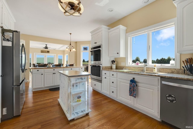 3631 E Pierceton Rd, Warsaw, IN 46580 - kitchen featuring appliances with stainless steel finishes and white cabinetry