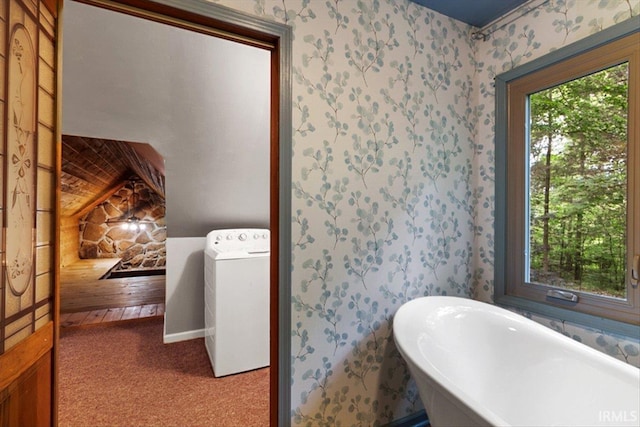 3911 Kings Ridge Rd, Mitchell, IN 47446 - bathroom with a freestanding tub and wallpapered walls
