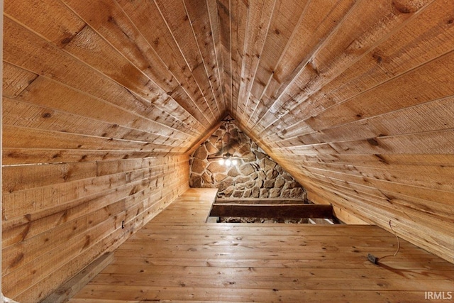 3911 Kings Ridge Rd, Mitchell, IN 47446 - additional living space with wooden ceiling, wood walls, vaulted ceiling, and hardwood / wood-style floors